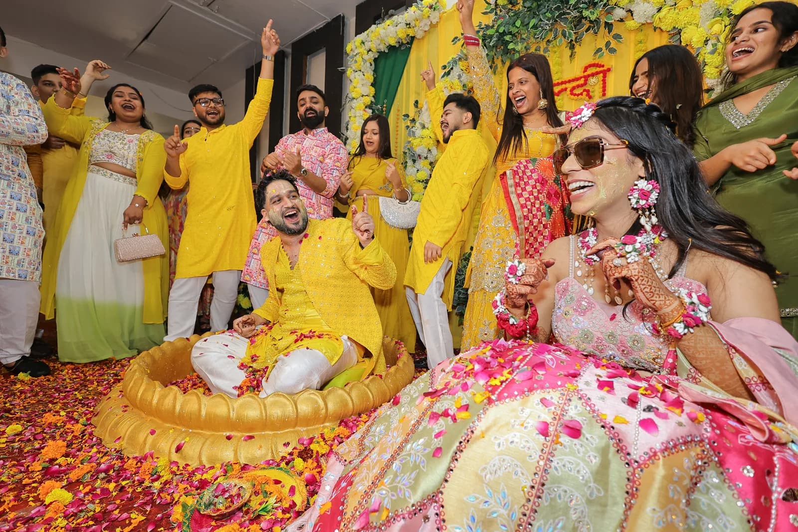 Candid Indian wedding moment showing authentic joy between bride and groom during celebration